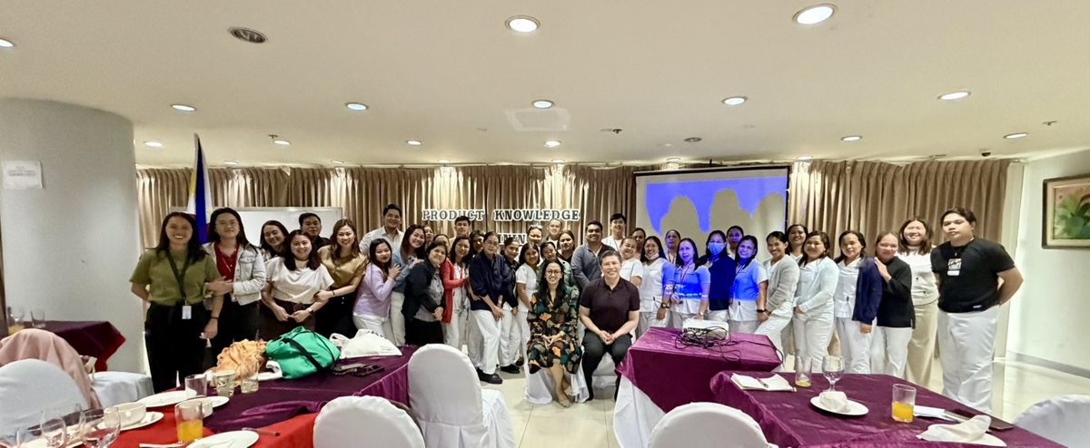 Group photo of pharmacists at an education programme
